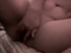 On livecam, my white, chubby girlfriend rubs her swollen slit.